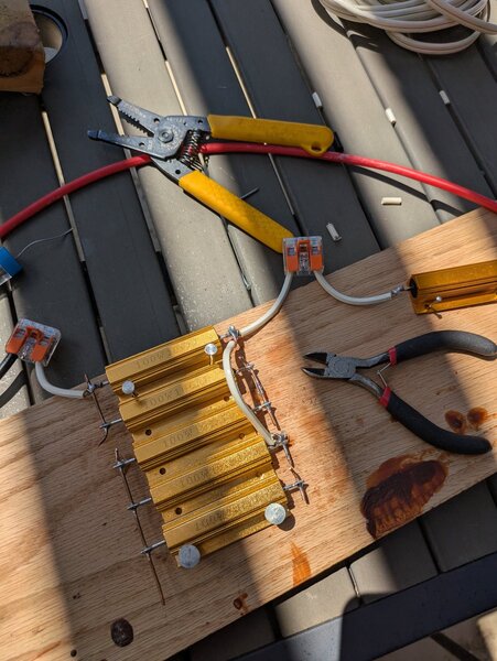 Resistors in a different, lower resistance arrangement on the same wooden board